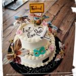 Torte zur Silberhochzeit mit Geldscheinen dekoriert